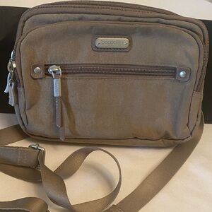 Baggallini Crossbody belt bag adjustable strap color is taupe RFDI